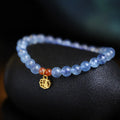 Ice translucent aquamarine crystal bracelet with 8mm round beads and sequin accents