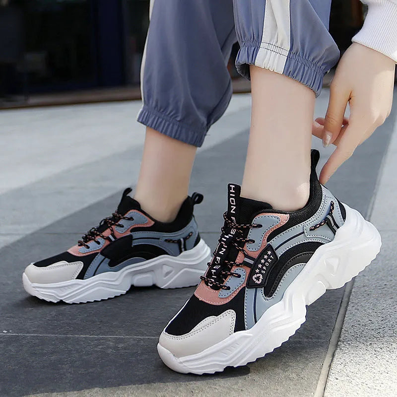 White women's casual sports shoes with mesh upper, PU sole, round toe, and ankle buckle.