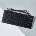 USB wired mini keyboard with noiseless keys in black, white, pink, or blue colours