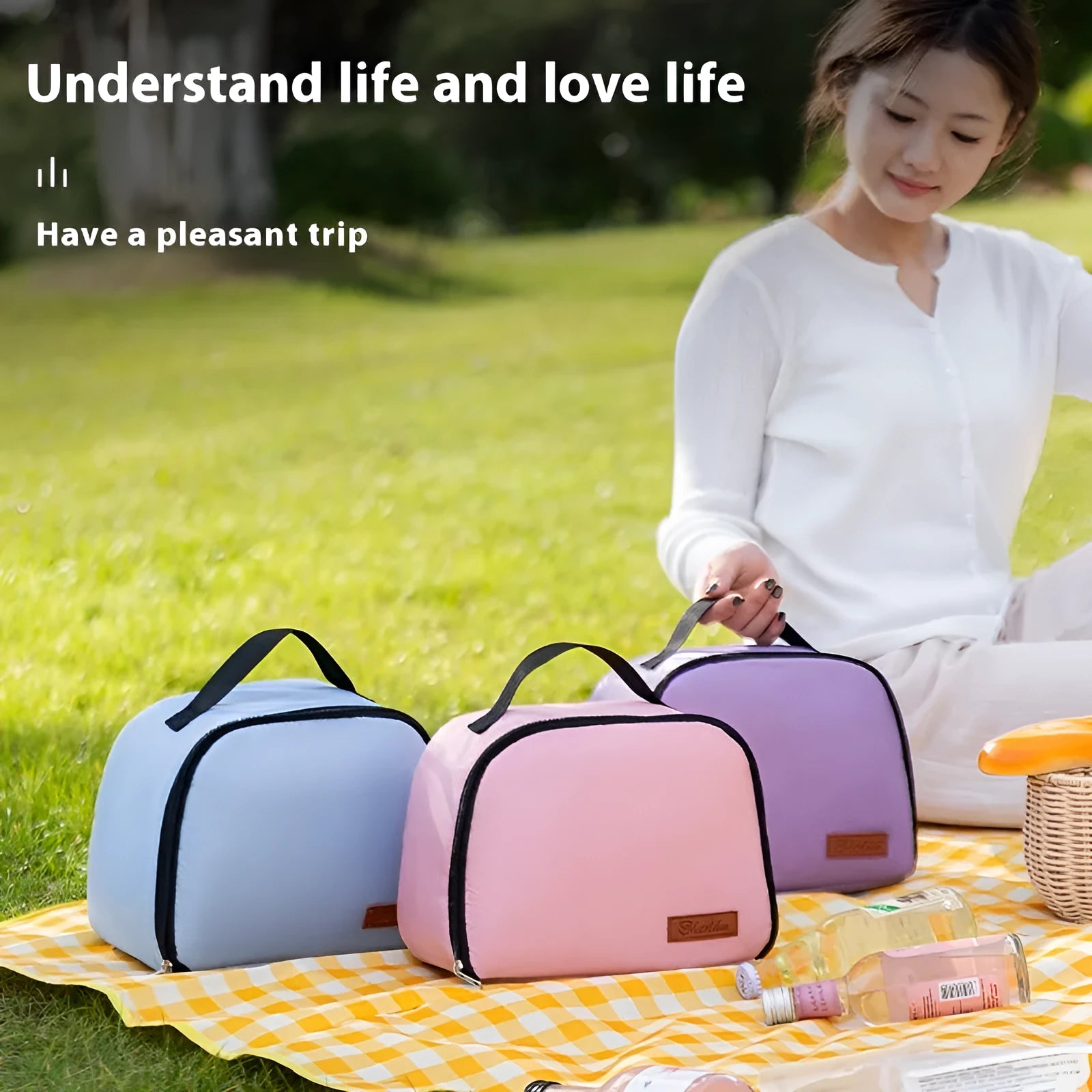 Large insulated lunch box bag in textured cloth, shown in blue colour with a bento box inside.