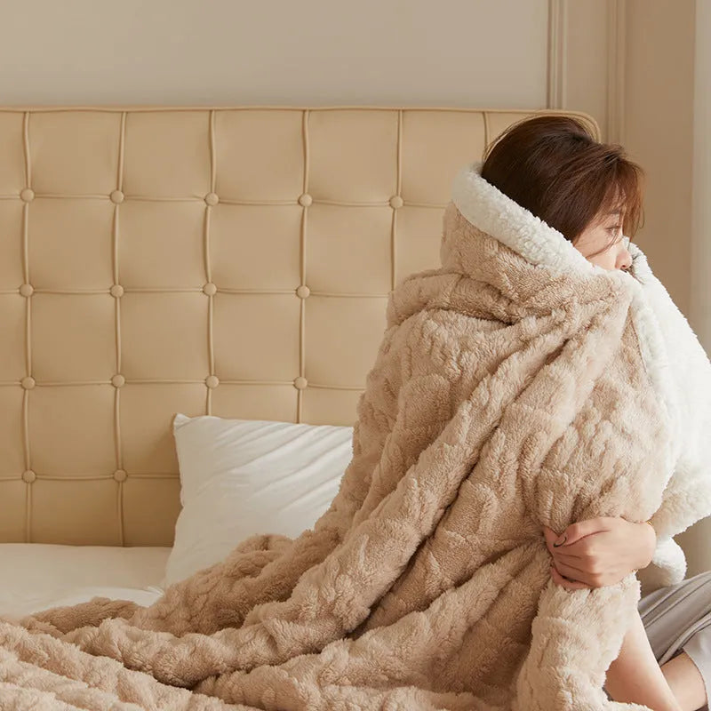 Thick taffeta thermal flannel winter blanket on a bed in tea green colour
