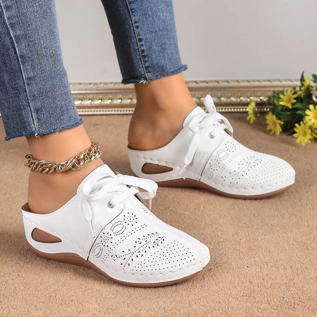 Women's lace-up wedge slippers with hollowed-out design in suede and rubber construction