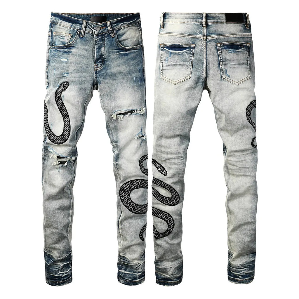 Man's blue distressed skinny jeans with a street fashion wash and button fly.