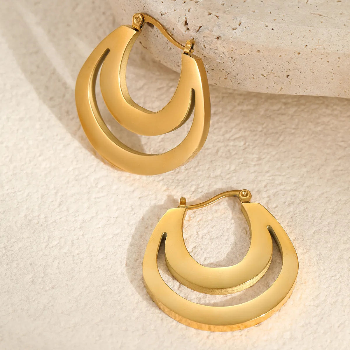 Geometric minimalist French earrings with stainless steel construction and 18K gold electroplating in gold and steel colour options