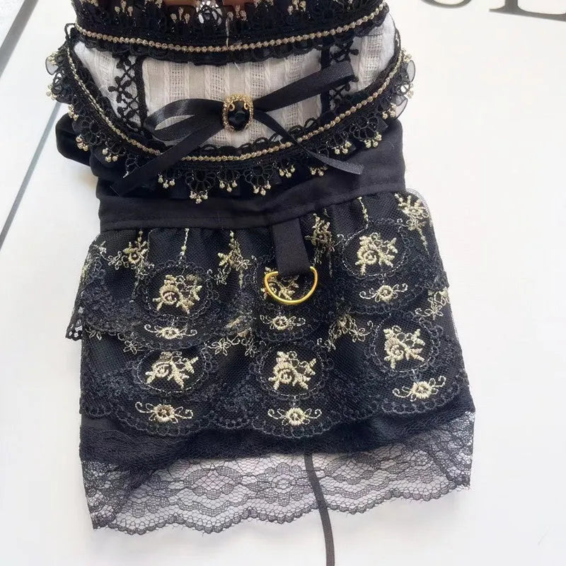 Golden Gothic princess style skirt costume for a small dog or cat on a mannequin.