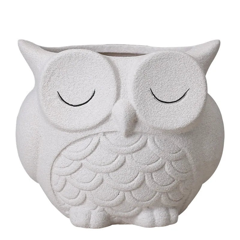 Handmade frosted ceramic owl succulent pot in light pink, measuring 11cm tall.