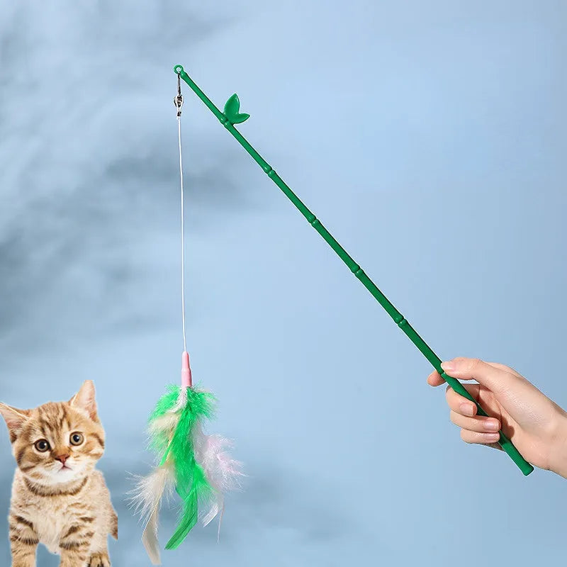 Green interactive cat wand toy with feather and bell refills for feline play