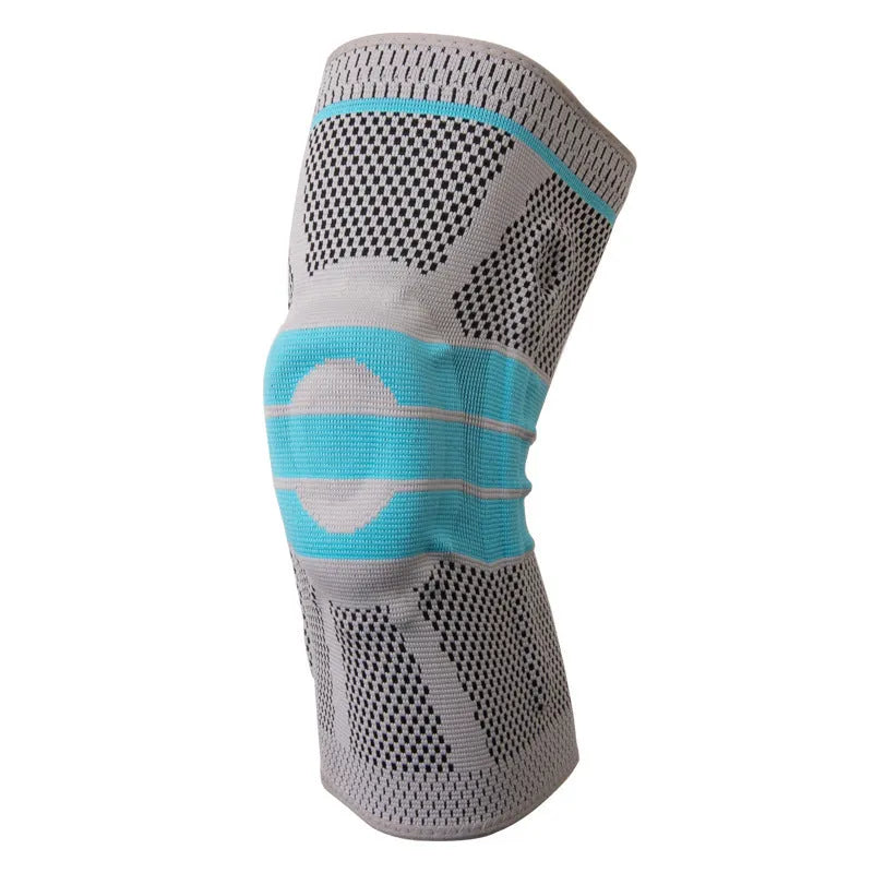 Sky blue silicone knee pad for basketball and sports on a knee.