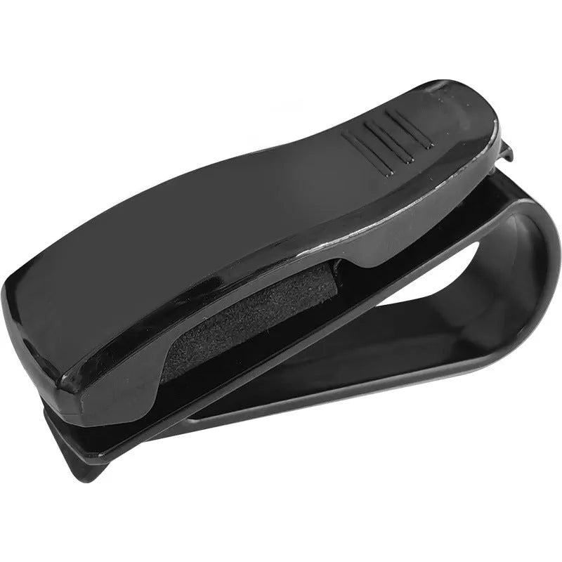 Black plastic car sun visor clip organiser for glasses, tickets and ID cards measuring 6.5 by 2.3 centimetres