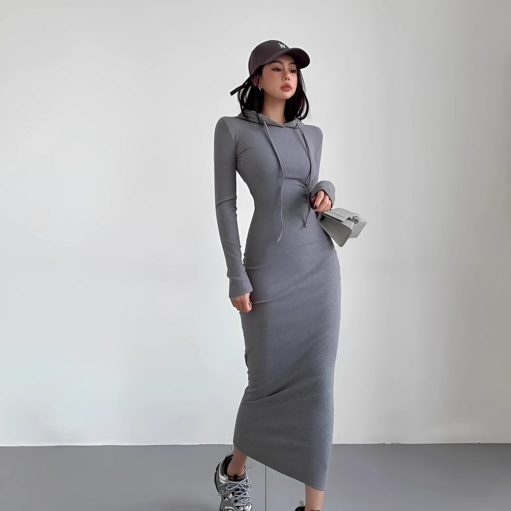 A woman's grey hooded long sleeve sheath dress with an over-the-knee length and high waist.