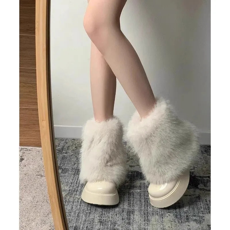 Women's black fleece-lined snow boots with waterproof rubber sole and round toe design