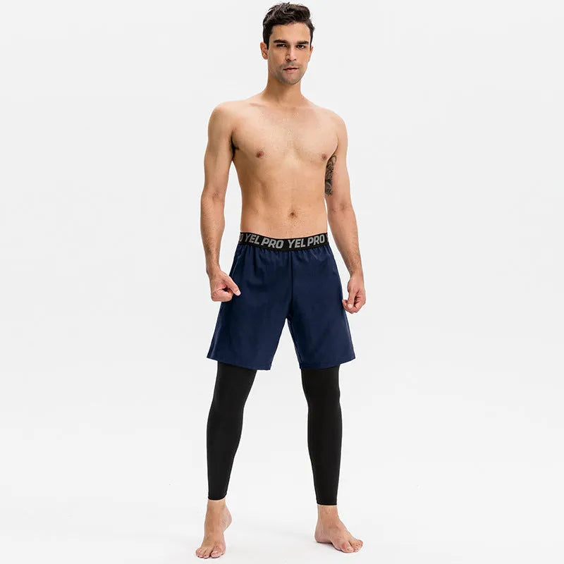 Man wearing grey quick-drying tight-fit polyester spandex sports pants for running.