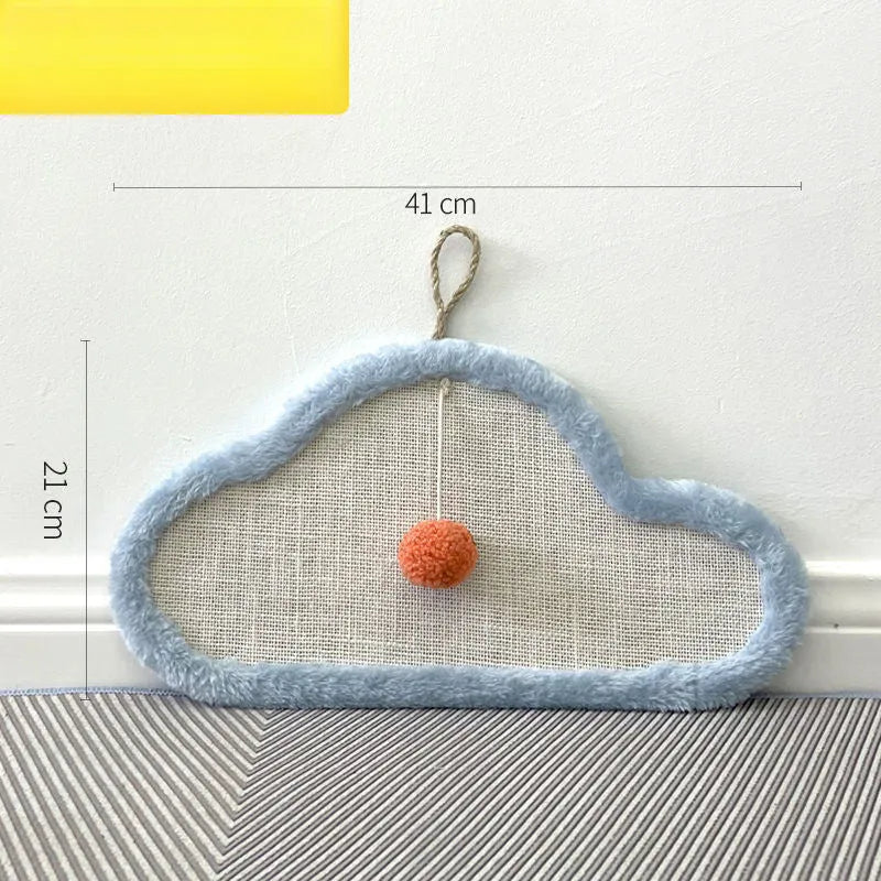 White sisal cat scratching mat with sleeping cat cartoon design mounted on a wall