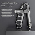 Electronic count spring grip hand exerciser with adjustable resistance and digital counter display