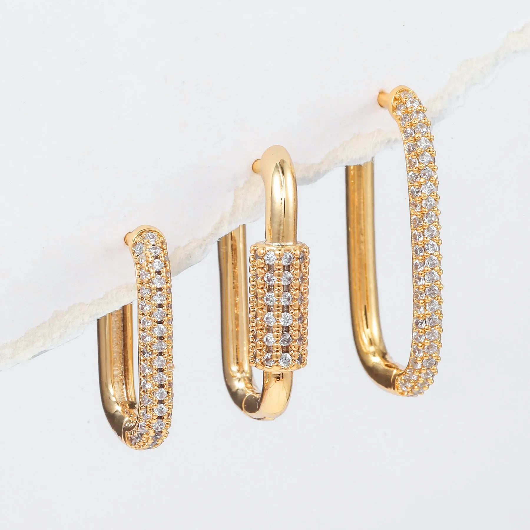 Set of three geometric ear clips with zircon inlay on copper in gold or white colours