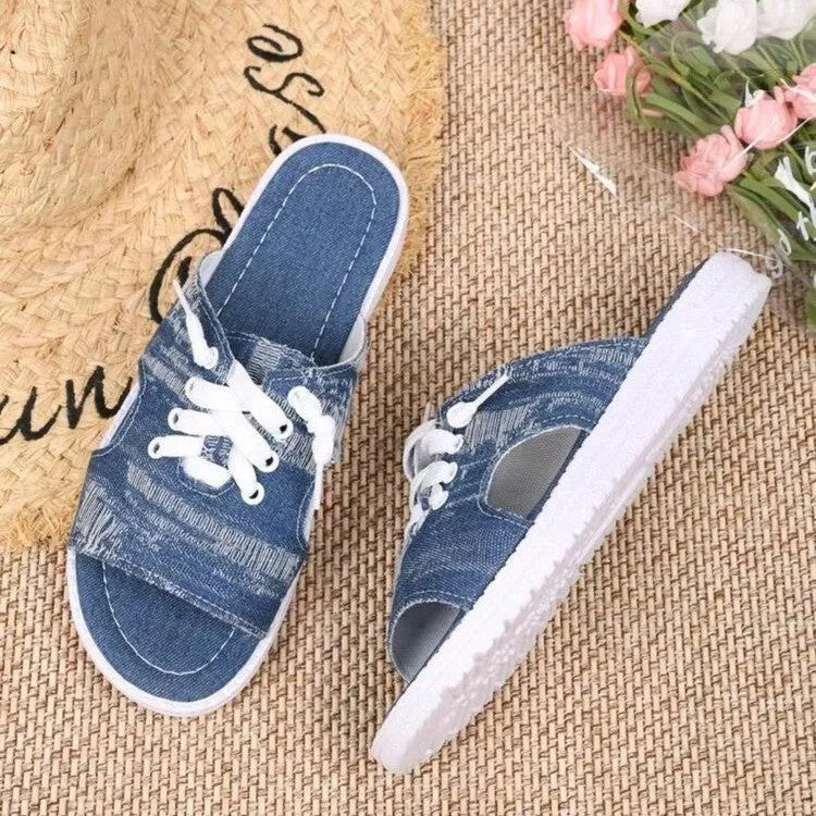 Blue Roman style women's canvas slippers with cloth upper and flat rubber sole