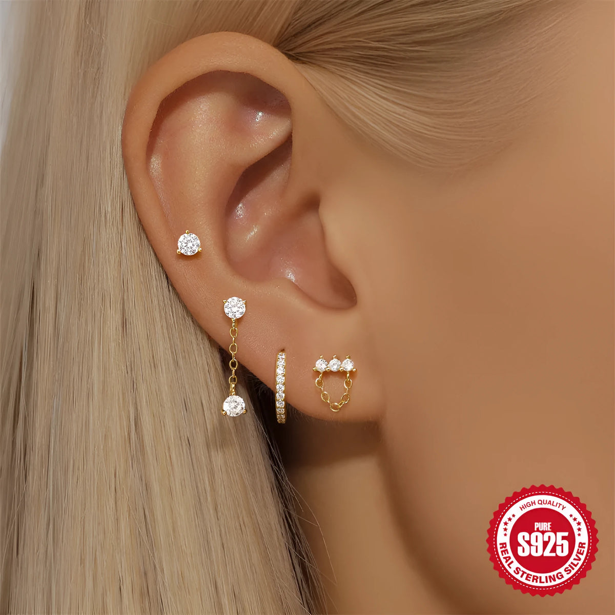 S925 sterling silver women's earrings with a geometric clover petal design in an electroplated gold colour.
