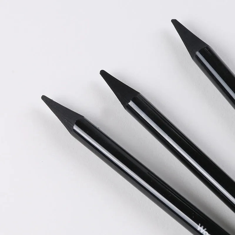 Graphite and carbonized pencil set showing six graphite pencils and three darker carbonized pencils on suction card packaging