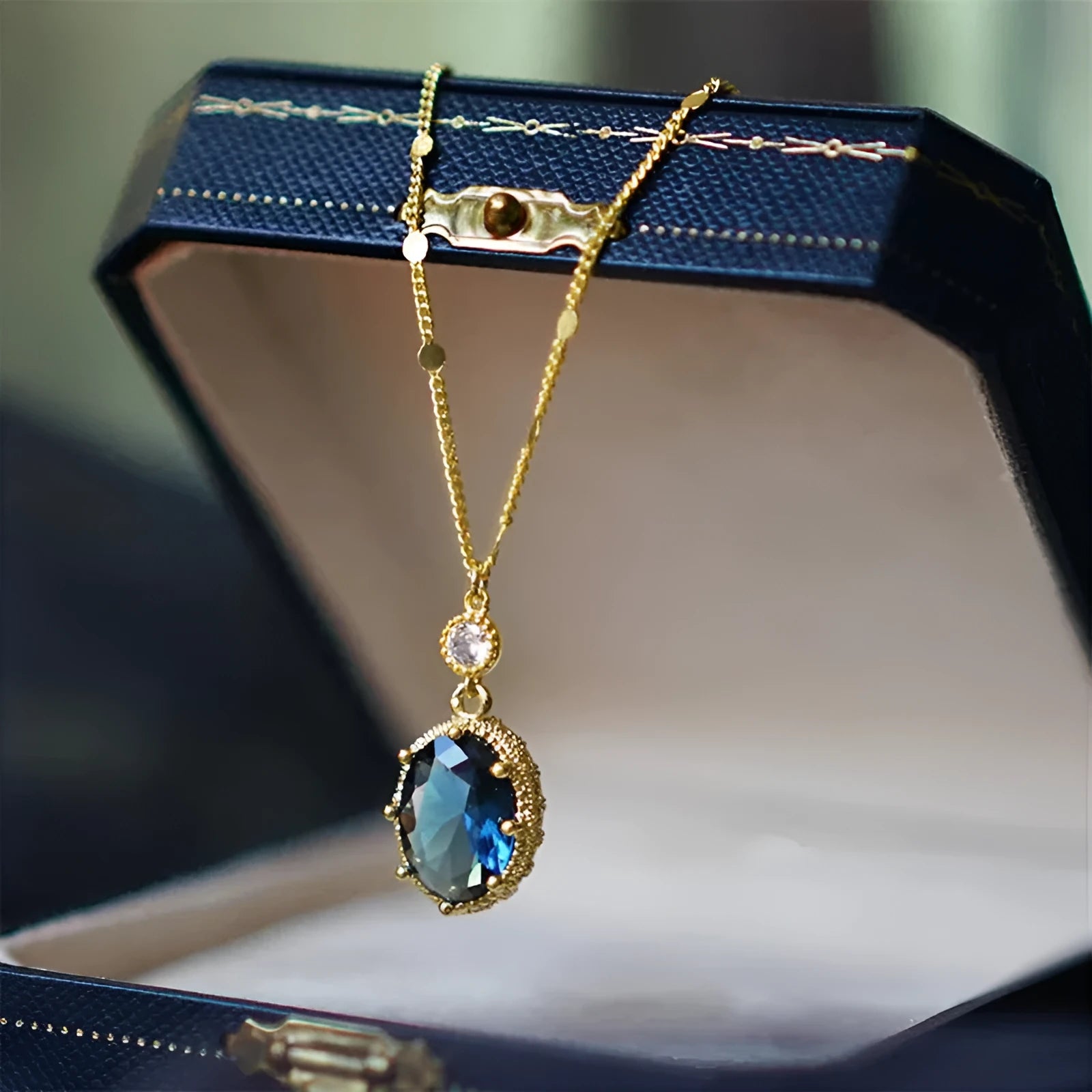 Gold electroplated geometry pendant necklace on adjustable chain with French retro design