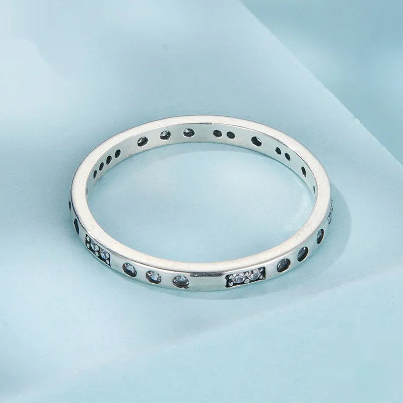 Silver ring with oxidised black I Love You moss design showing three available sizes