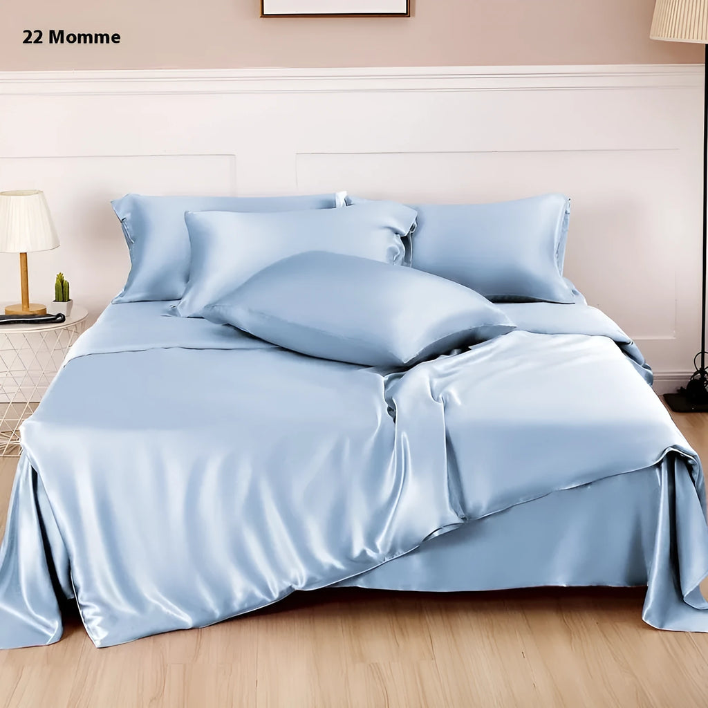 Double-sided silk duvet cover in solid colours showing lotus pink, pea green, and bright brown options