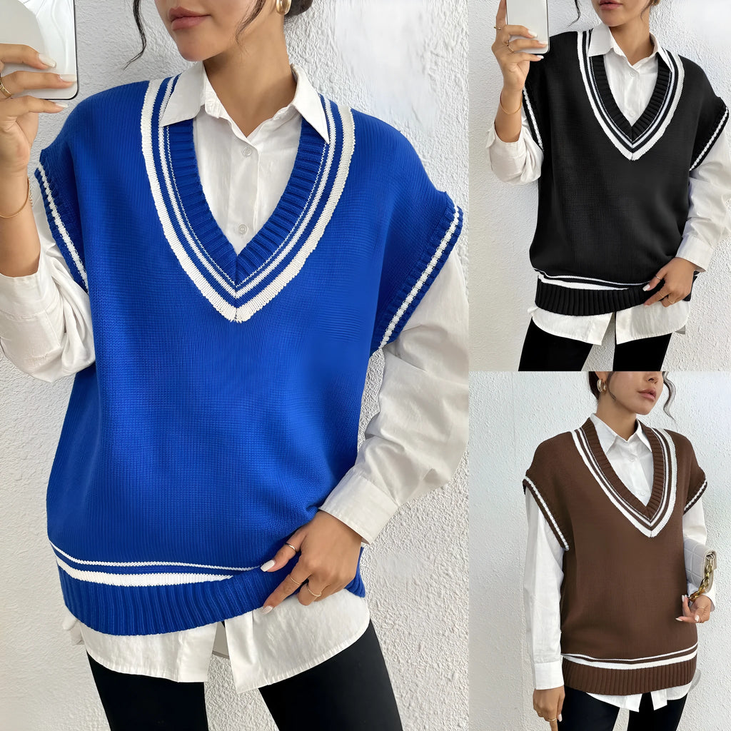 Loose fit blue women's vest sweater in college style, shown as a pullover on a hanger.