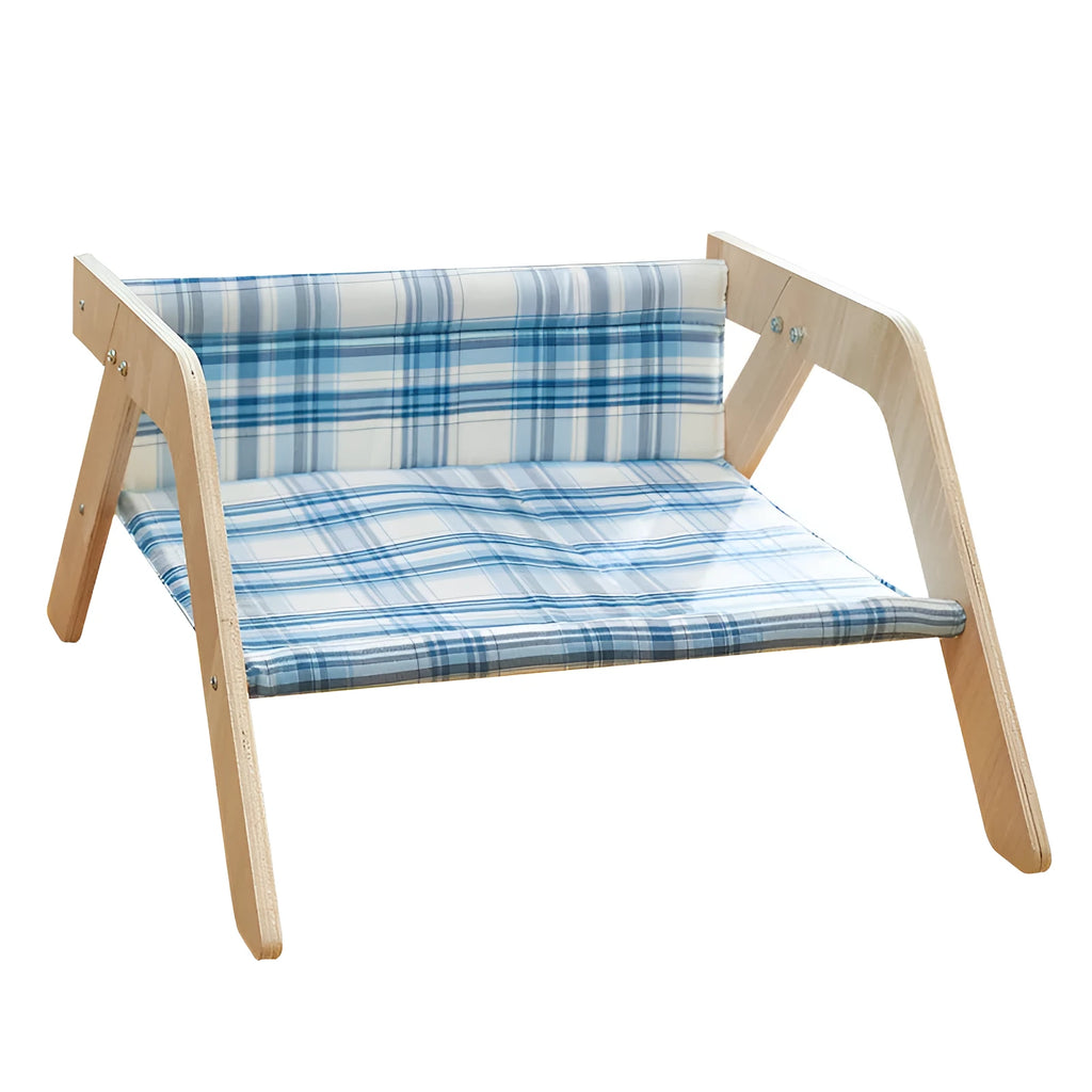 Wooden framed elevated cat bed with blue cloth hammock in beach chair style.