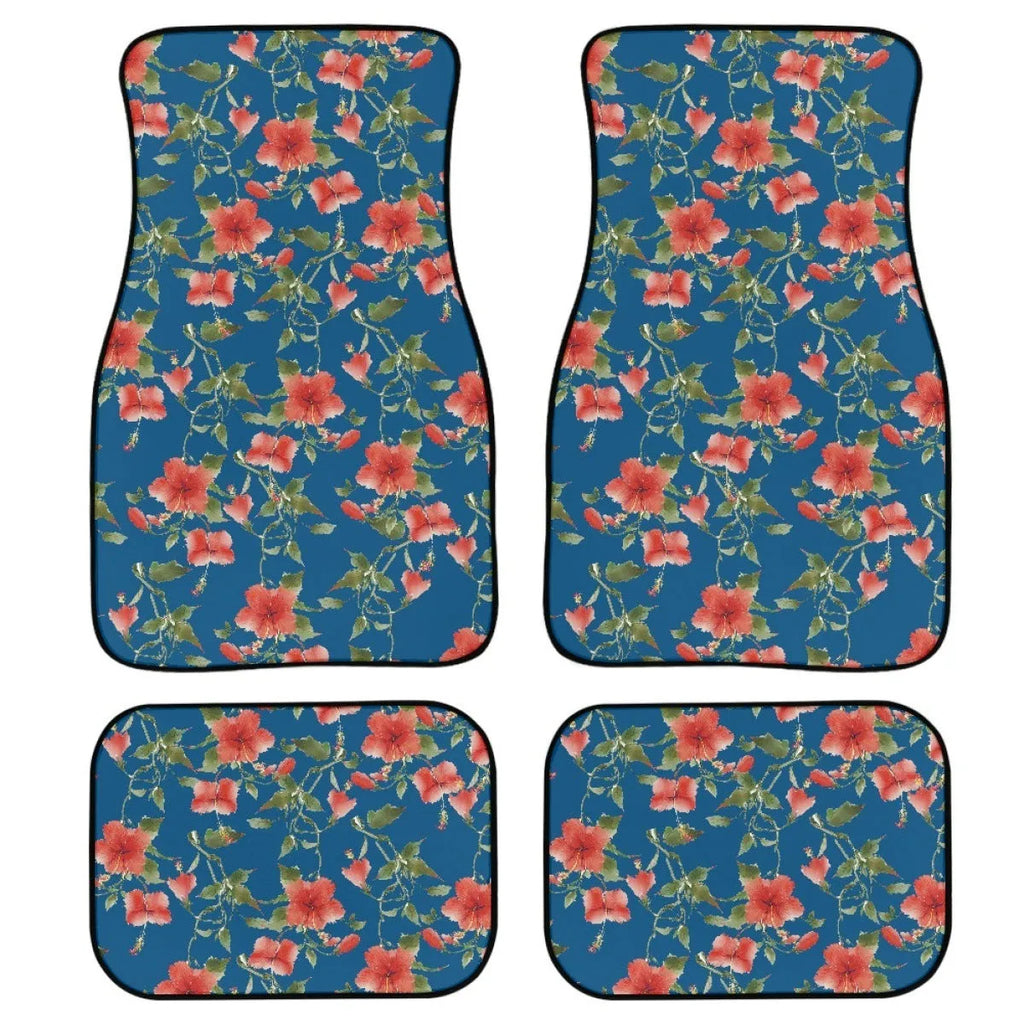 Black four-piece rubber car foot mat set with a textured surface.