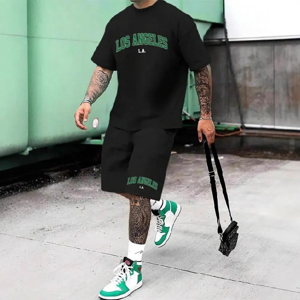 Man wearing a short sleeve top and shorts from the 3D printed letter personality suit set.