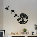 Black electroplated iron wall art hanging ornament with modern simple design, functioning as an indoor wind chime.