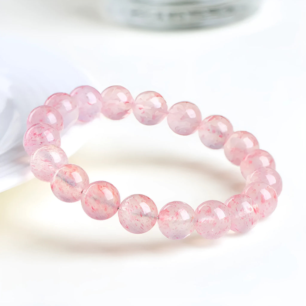Strawberry quartz crystal ball bracelet with natural white water body colour and geometry beads