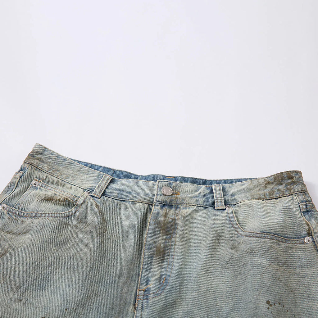 Blue washed cropped denim jeans with straight leg and zipper fly on mannequin