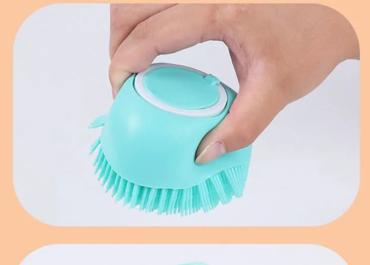 Blue silicone dog bath brush with non-slip handle for washing and massage.