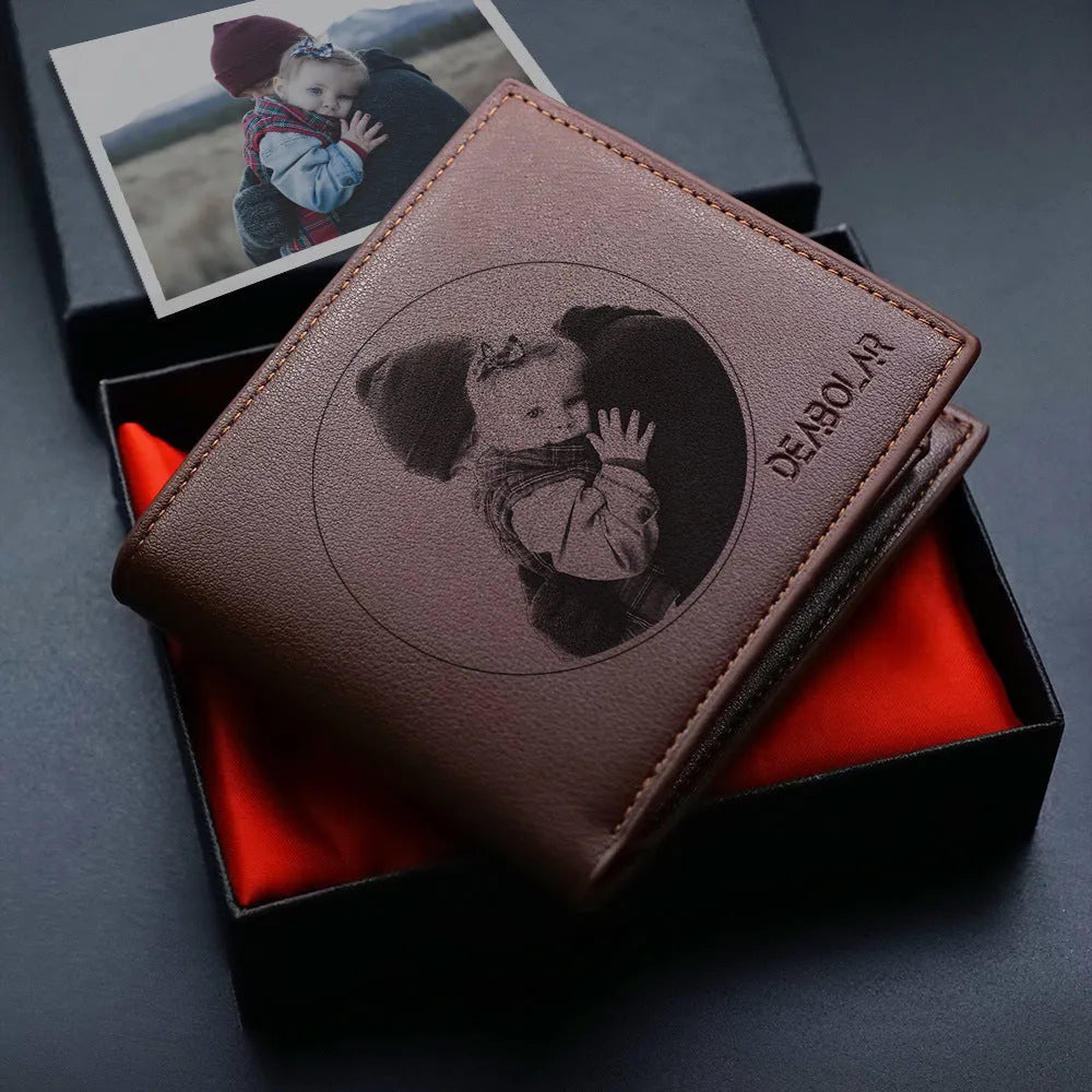 Men's leather wallet with a zip closure, presented as a gift.