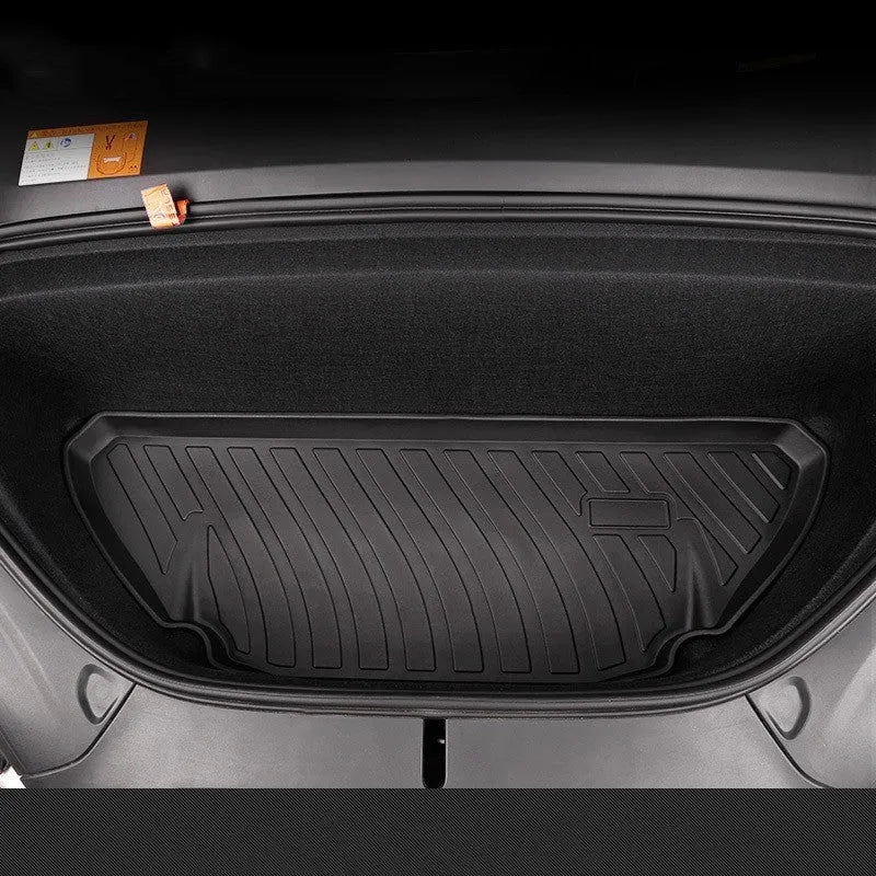 Tesla floor mats made from black rubber with textured TPE footrest section for Model 3, Y, S, and X vehicles