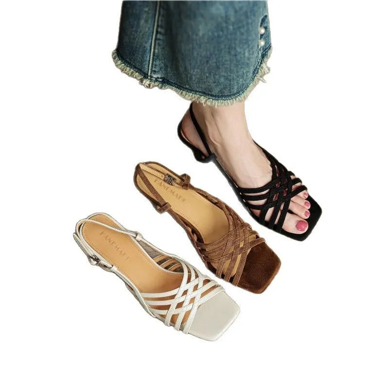 Retro light brown women's sandals with thin cross straps, square toe, ankle buckle, and a mid-height heel.