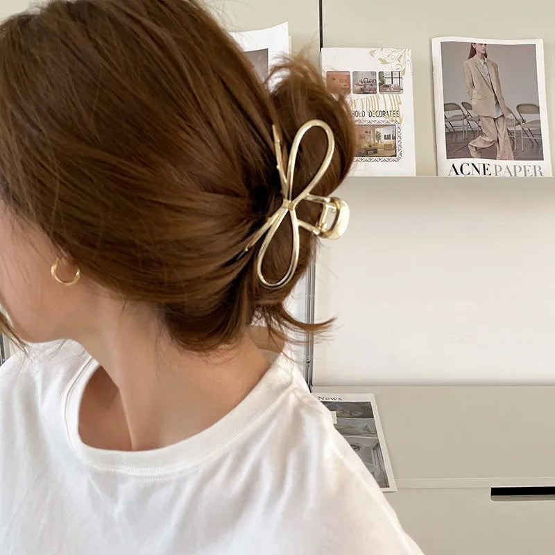 Women's Korean-style alloy hair barrette with bow decoration in gold or silver colour