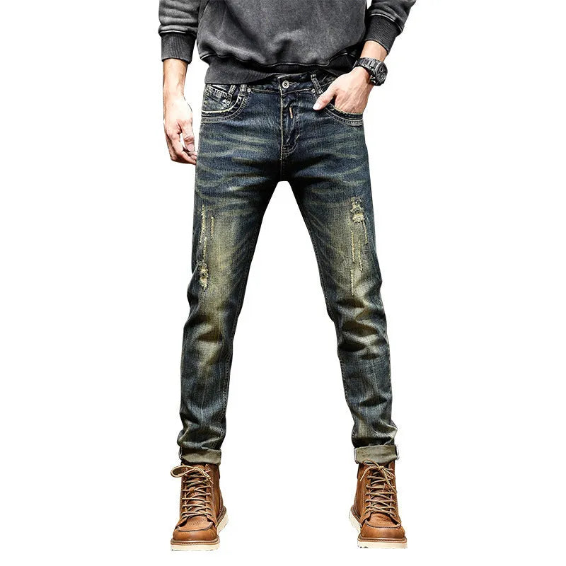 Men's retro colour skinny jeans with a zip fly, shown laid flat.
