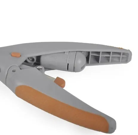 ABS plastic dog nail clipper with light on and imitation blood line guide visible on cutting head.