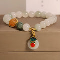 Women's ice jade bracelet with pearl accents and a jade buckle on a retro design.