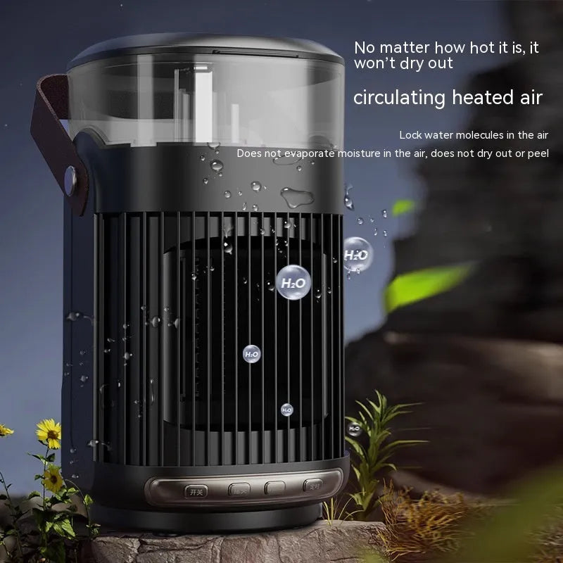 Black portable heater with humidifier showing front control panel and compact 24x13x13cm dimensions