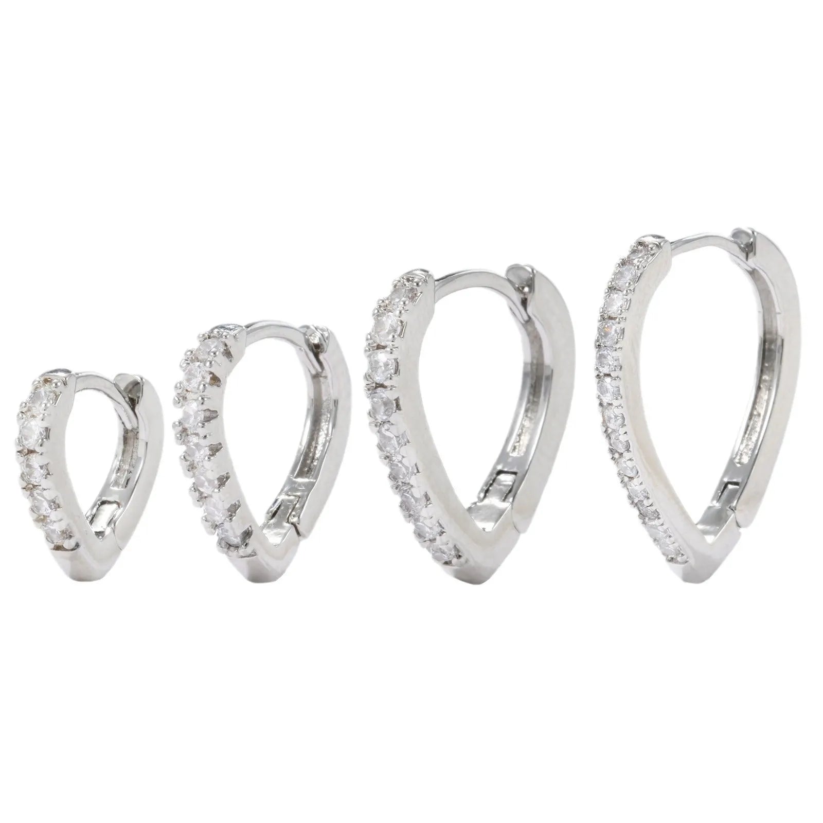 Geometric heart-shaped ear clip in gold and white colours with copper construction and electroplated finish