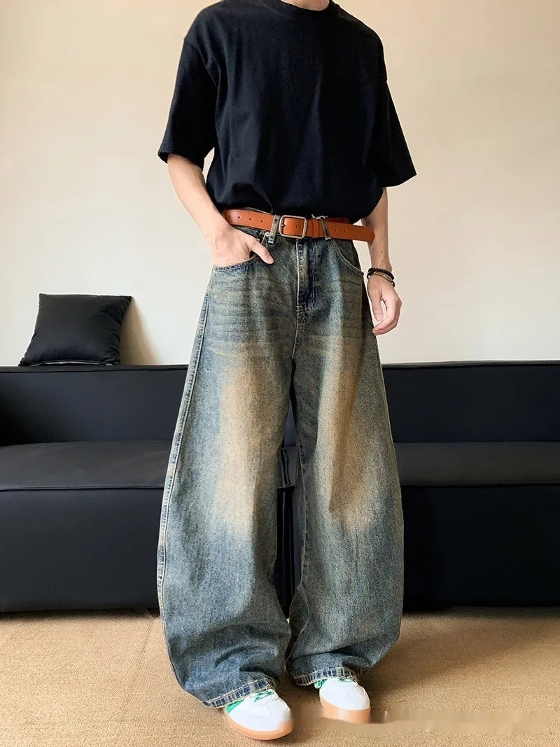 Men's retro blue distressed denim pants with wide leg cut and micro elasticity fabric