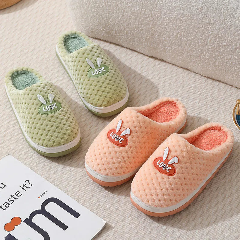 Women's plush rabbit plaid house slippers with thick rubber non-slip soles in apricot colour.