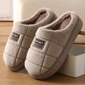 Men's plaid pattern slippers with thick sole and artificial wool lining in grey and brown colour options