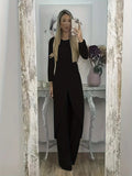 Women's black casual two-piece lounge set with long sleeves and matching trousers on a hanger