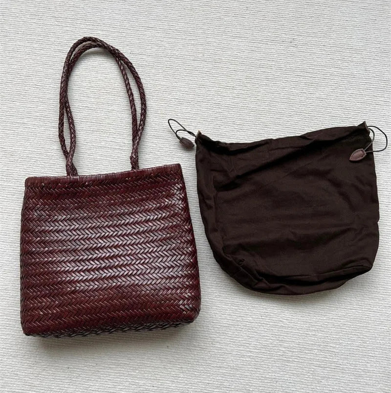 Brown woven leather tote bag with three-dimensional pockets measuring 27cm high by 30cm wide