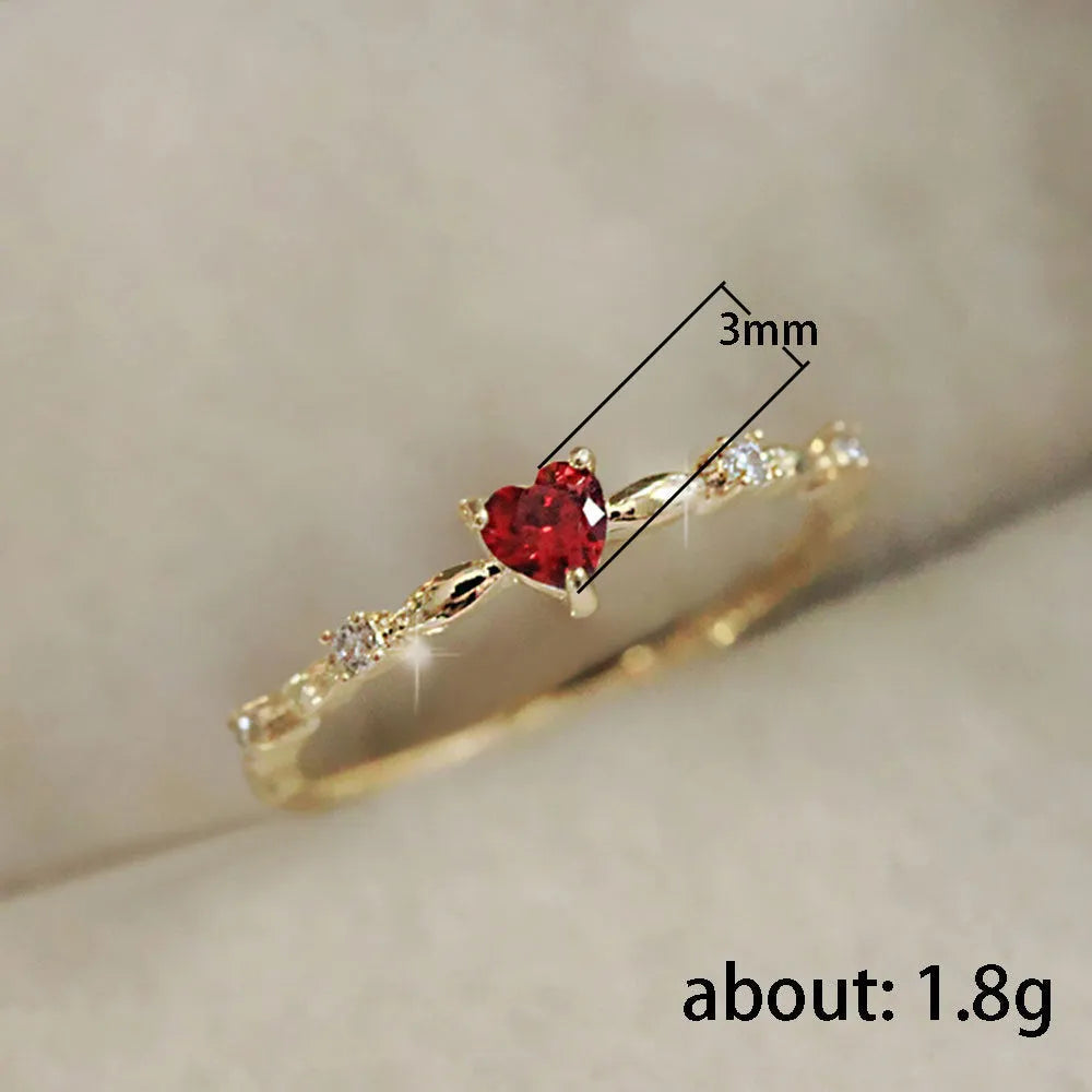 Personalised zircon peach heart ring in gold or silver electroplated finish on copper, available in UK sizes 6 to 10