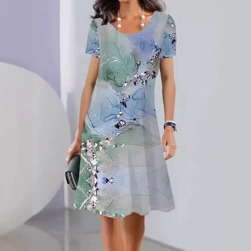 Light blue summer dress with floral print, A-line mid-length skirt, round neck and short sleeves