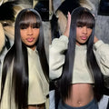 Women's natural colour full mechanism human hair wig shown at medium length.